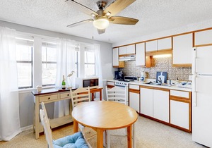 Water-view studio with pool, central AC, tennis & sauna