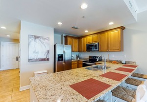 Waterfront Snowbird retreat with private balcony & pool - near the beach