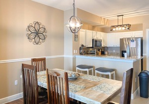 Welcoming waterfront condo with a furnished balcony, pool & pool spa