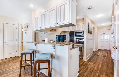 Fort Bay Condo | Amazing beachfront home with pool, hot tub & beach access