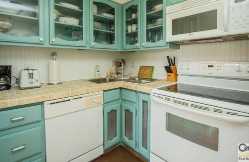 Marco Island Condo | Amazing Coastal Cottage Beachside Condominium at the Tradewinds on Marco Island!