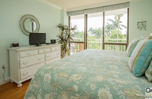 Marco Island Condo | Amazing Coastal Cottage Beachside Condominium at the Tradewinds on Marco Island!