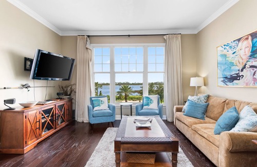 Upper Grand Lagoon Condo | Bayfront, 4th-floor condo with hot tub, pool & views of Nicklaus Golf Course