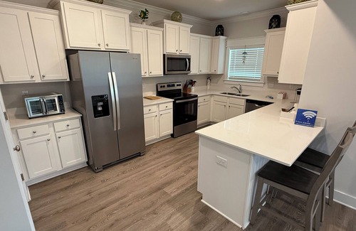 Panacea House | Charming Family beach getaway pool camp arcade bikes quiet St Teresa