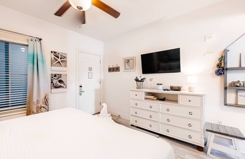 Sunnyside Apartment | Contemporary condo with lake views, free WiFi and cable, and resort amenities