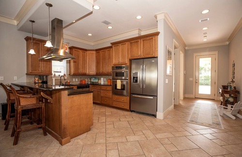 Fort Bay House | Exclusive private home in gated community across the street from the beach.