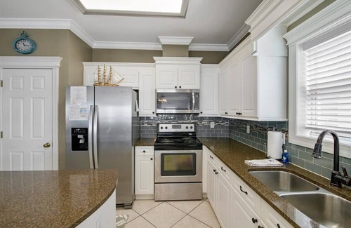 Lullwater Beach On Gulf Of Mexico House | Experience luxury at the Diamond in the Rough! 5-bedroom beachfront home in Pier Park Area