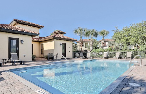 Villa Lago House | Golf course-front home with sunset views & golf cart - walk to Baytowne Wharf