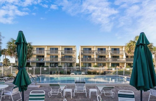 St. George Island Condo | HEAR THE ROAR of the ocean and the slow flapping of the blue herons.
