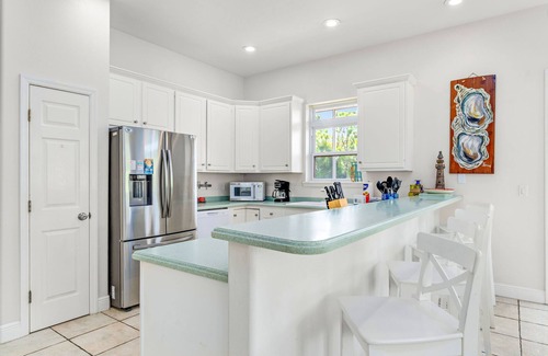 Plantation House | Heated Pool, 4 BR, Island Blessing, Beach Chairs, Short Walk to Beach