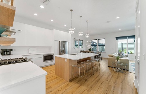 Silver Sands Beach House | Luxury custom townhome with private heated pool & elevator!