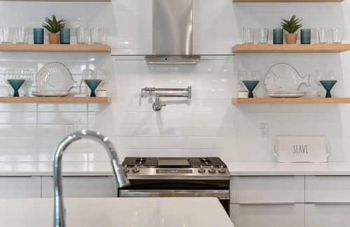 Silver Sands Beach House | Luxury custom townhome with private heated pool & elevator!