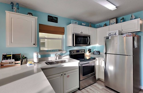 Navarre Beach Condo | Navarre Condo with Bay Views | Community Pool | Just Steps to the Beach