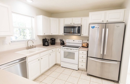 Gulfview Heights House | New to Dune Allen Realty! 10-min walk or 2-minute golf cart ride away to beach!