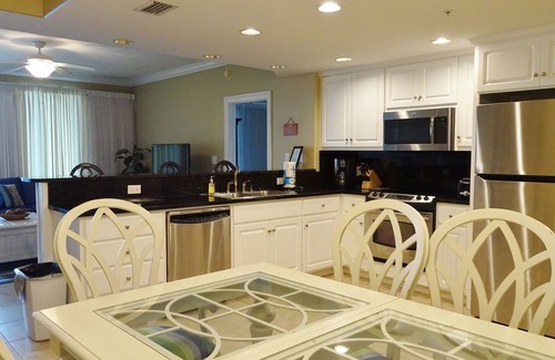 Lower Grand Lagoon Condo | Oceanfront Penthouse-Legendary Sunset Views -Free Beach Chairs & New 65” TV!