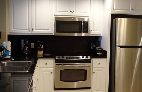 Lower Grand Lagoon Condo | Oceanfront Penthouse-Legendary Sunset Views -Free Beach Chairs & New 65” TV!