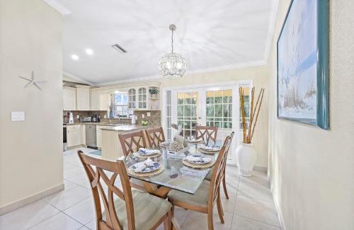 Marco Island House | Pet-friendly waterfront with pool and steps to beach