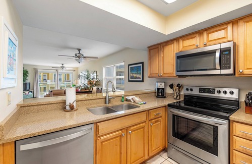 Pensacola Beach Condo | Regency Towers #208W, beach chairs, umbrellas, new leather couches!