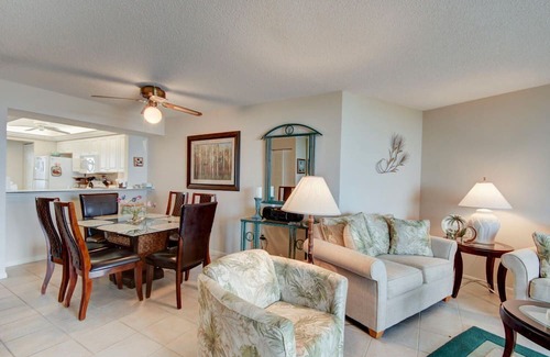 Marco Island Condo | South Seas Tower 4 #701 Looking at Sunset. Decorated with light pastel décor.