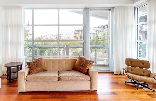 Port St. Joe Condo | Stylish coastal condo w/ shared pool, floor-to-ceiling windows & free WiFi