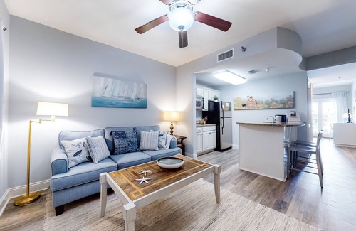 Sunnyside Apartment | Stylish condo with lake views, bike rentals, & pools - walk to the beach