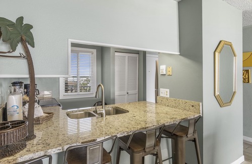 Holiday Isle Condo | The Islander 501 - Complimentary Beach Service - Heated Pool