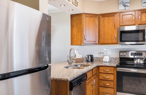 Holiday Isle Condo | The Islander 717 Don't Worry Beach Happy! Free Beach Service - Heated Pool