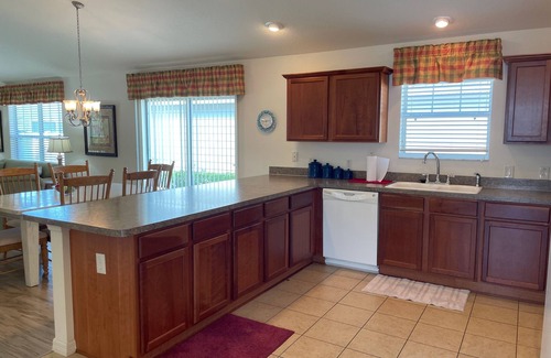 Lake Sumter Landing House | Walking distance to Lake Sumter Landing! Small Dog Friendly Villa w/Golf Cart