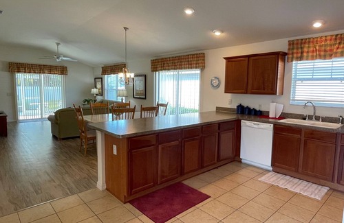 Lake Sumter Landing House | Walking distance to Lake Sumter Landing! Small Dog Friendly Villa w/Golf Cart