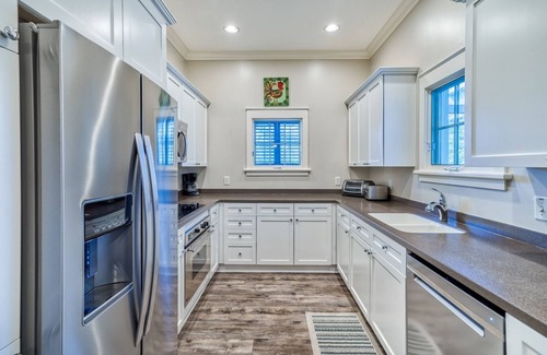 Watercolor Condo | WaterColor 3BR Condo, Beach Club Passes, Bikes, Parking, Butterfly Garden View, And Bunk Room!