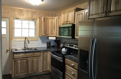 Bear Lake Cottage | 100' Prime Lakefront w/sandy lake bottom - updated cottage w/dock/boats/bikes