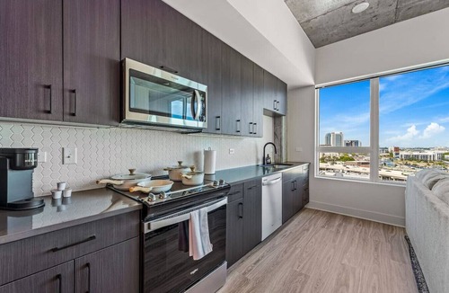 Channel District Apartment | 14th Floor SkySuite Studio | DT Views | Pool & Gym