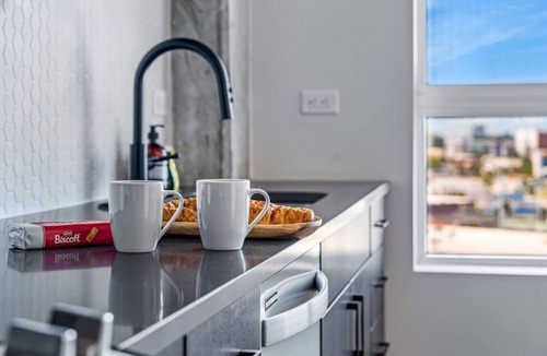 Channel District Apartment | 14th Floor SkySuite Studio | DT Views | Pool & Gym