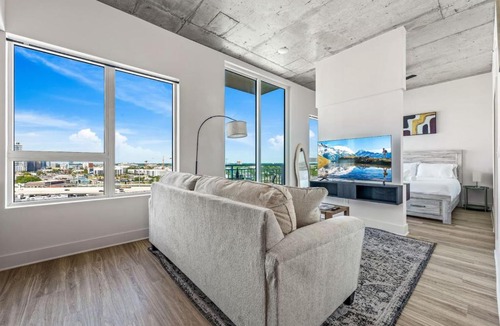 Channel District Apartment | 14th Floor SkySuite Studio | DT Views | Pool & Gym