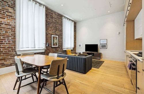 Tulane - Gravier Apartment | 1BR in Historic Schoolhouse | Near CBD and French Quarter