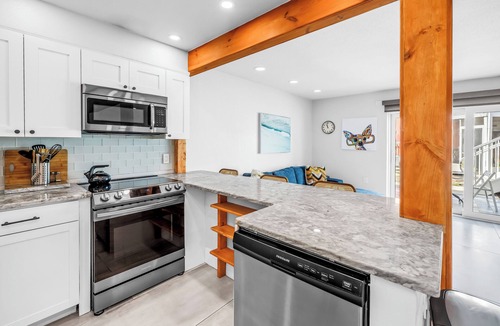 Bayview Condo | 1BR Waterfront Condo + Private Beach + Heated Pools + Stylish Remodel in St Pete