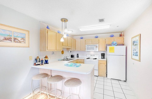 Navarre Beach Condo | 1st Floor Cozy Tropical Condo W/Bay Views Pool & Grills