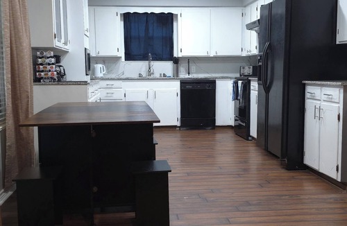 Henderson House | 2 bedroom home with truck and trailer parking. Safe and secluded.