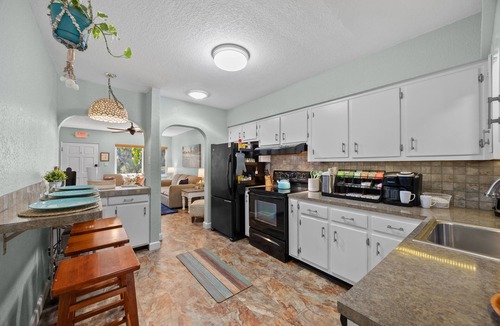 Cocoa Beach Cottage | 2 Homes Together|Sleeps 16|Walk 2 Beach|Firepit