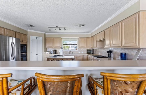 Jamaica Beach House | 22 Palms: Canalfront Home with Pool, Kayaks & Beach Toys