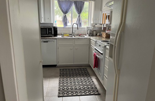 Trinity House | 3-bedroom home, waterfront patio, fishing, kayaking, swimming, yoga room