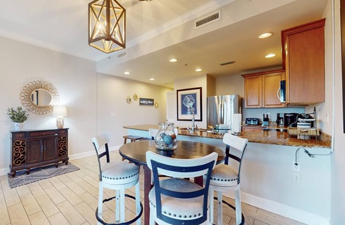 Upper Grand Lagoon Condo | 3rd-floor beach & pool-view condo with outdoor pool, hot tub, grills, balcony
