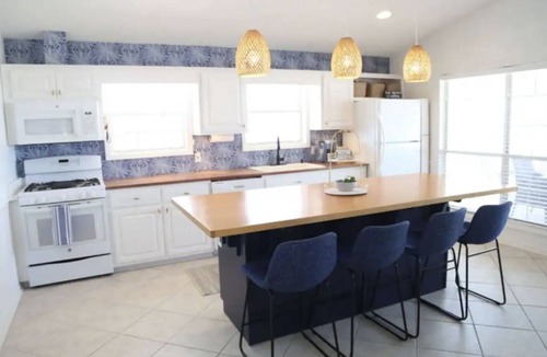 Riviera Beach House | 4-bedroom house, Heated Pool, Hot Tub, 6 person Golf Cart. 2 blocks from beach.