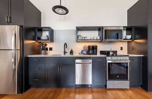 Central Business District Hotel | 4BR Rare Group Space + Private Patio on Canal St | The Mayfair