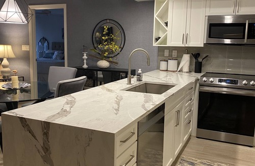 Pelican Bay Condo | 5 min walk to private beach with access to restaurant, bar and beach chairs.