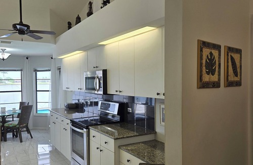 Pelican House | 80-ft Waterfront Resort-like Retreat to Relax; Heated Pool, Jacuzzi, Bikes, Pier