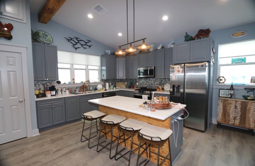 Grand Isle House | A-Bear's Waterfront with pier and boat access. Coastal Realty Group