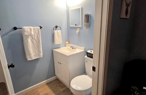 Board Camp House | Accessible Cabin Escape with Cozy Woodland Charm in Mena, Arkansas