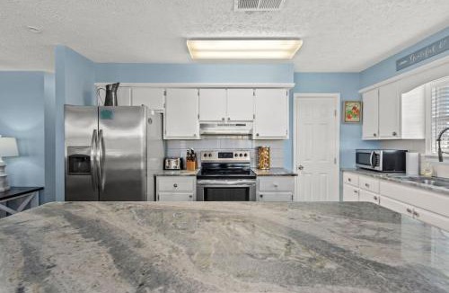 El Centro Beach House | Anchors Away - Private Pool, Seasonal Hot Tub, Game Room, Walk to Beach, Pets OK