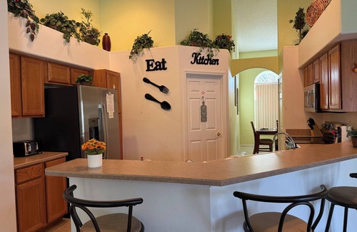 Orange Tree House | 🌴Antigua Lake View Villa with Peaceful Pool & Waterfall. Near Disney Free WiFi.